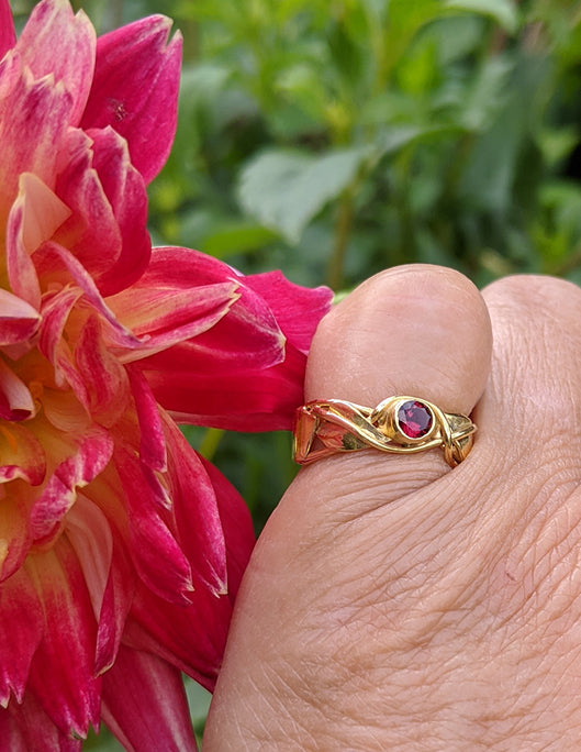 SOLD: Band style ring with bezel set garnet